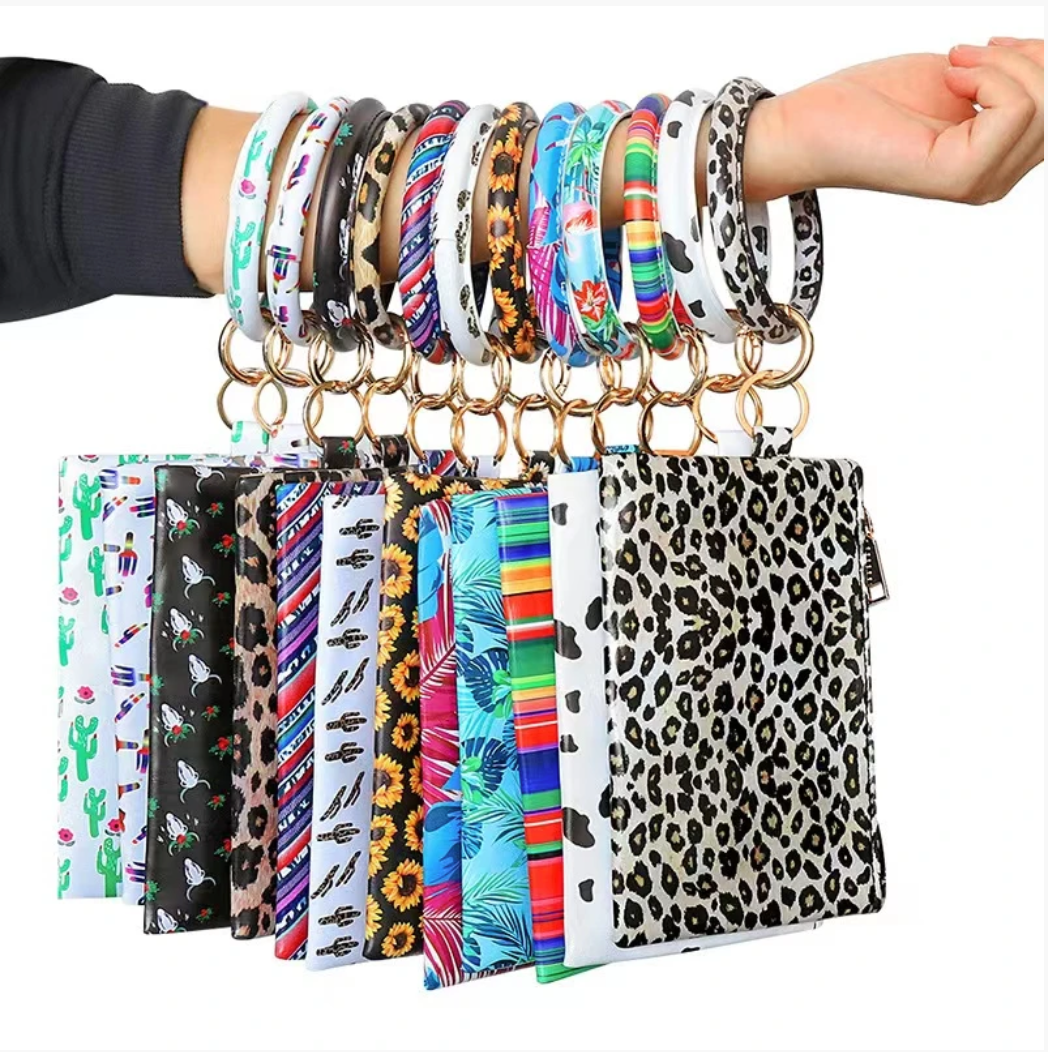 Tassel Bracelet Handbag - B.O.S.S. Collection