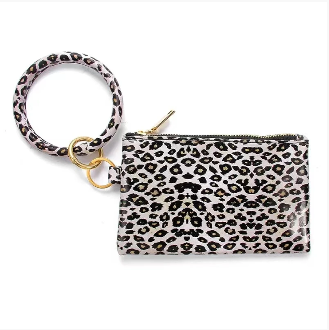 Tassel Bracelet Handbag - B.O.S.S. Collection
