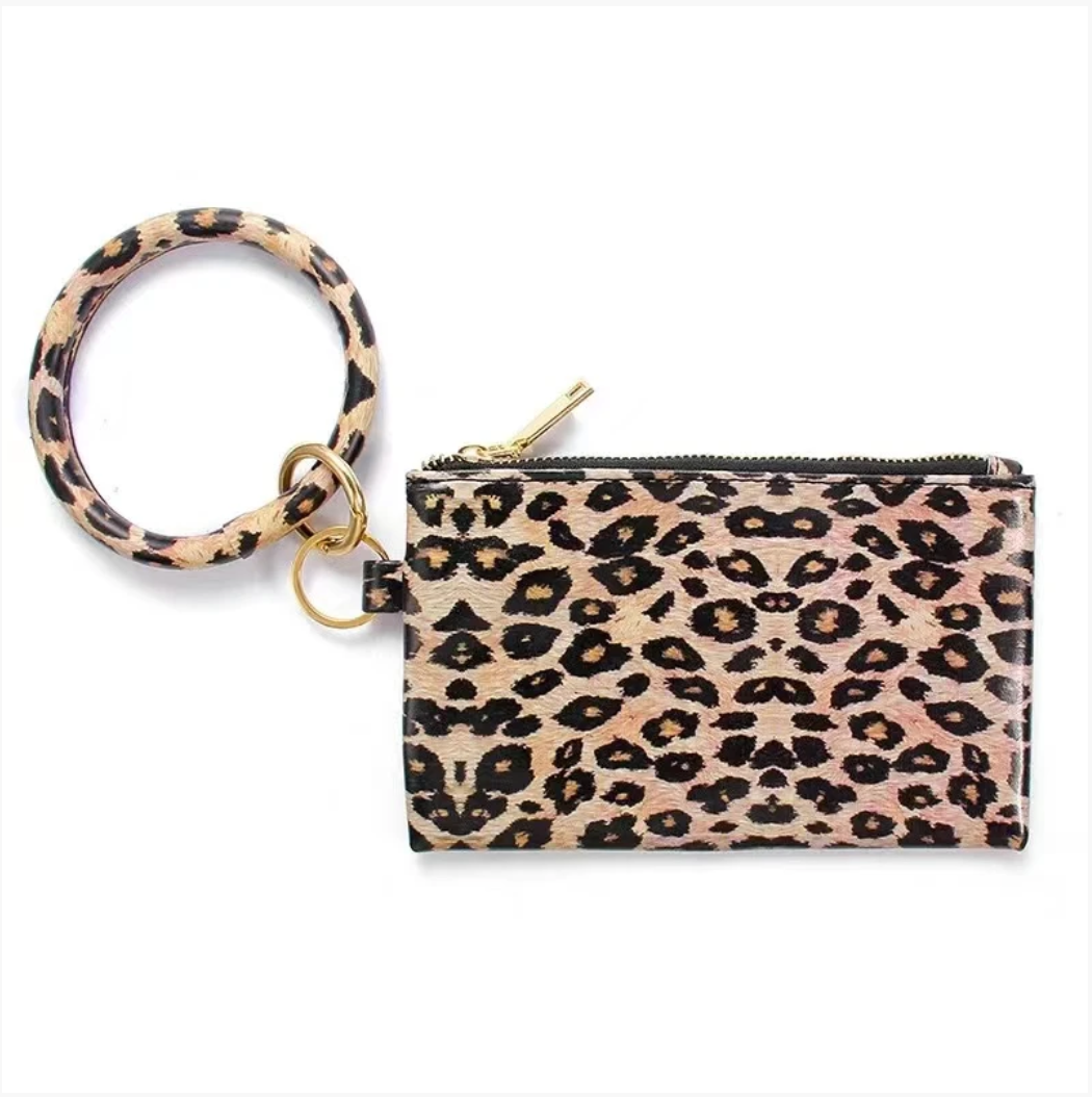 Tassel Bracelet Handbag - B.O.S.S. Collection