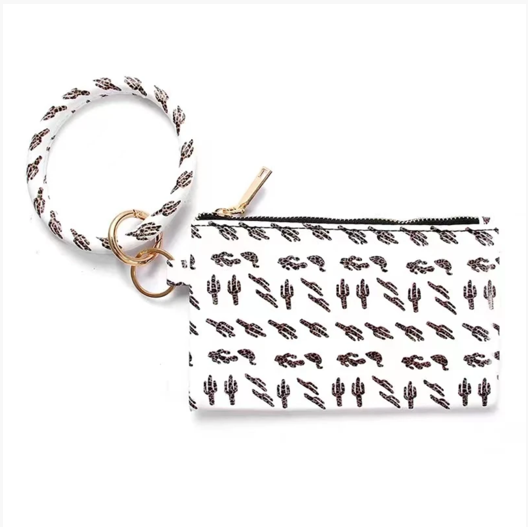Tassel Bracelet Handbag - B.O.S.S. Collection